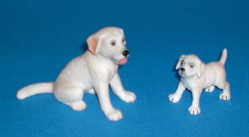 Labrador hell und Welpe